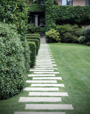 Large slabs of concrete make a stepping stone path